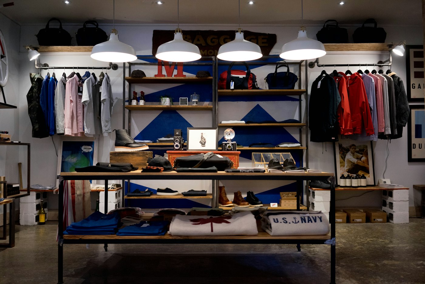 Clothing store interior with organized displays and customer walkways